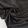 Brown matte polyester satin with a soft touch and elegant drape ideal for dresses skirts and linings. High-quality deadstock collected in Stock from a Maison de Couture in Italy.