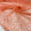 Very soft and light lace in peach color, polyester with beautiful floral design. High-quality deadstock fabric collected in Stock from a Maison de Couture in Italy.