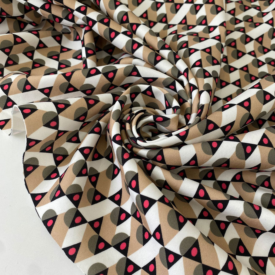 Polyamide and elastane light neoprene with a geometric design in the shades of white, beige, black, dusty olive and carmine rose. Very soft, light and flowy. Ideal for jackets, trousers, dresses and skirts. High-quality deadstock collected in Stock from a Maison de Couture in Italy.