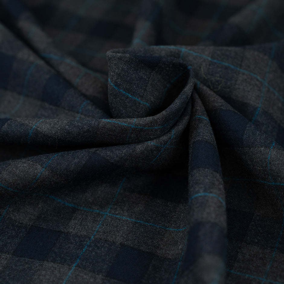 Blue and gray square flannel in pure virgin wool. High-quality deadstock fabric by the meter collected in Stock from a Maison de Couture in Italy.