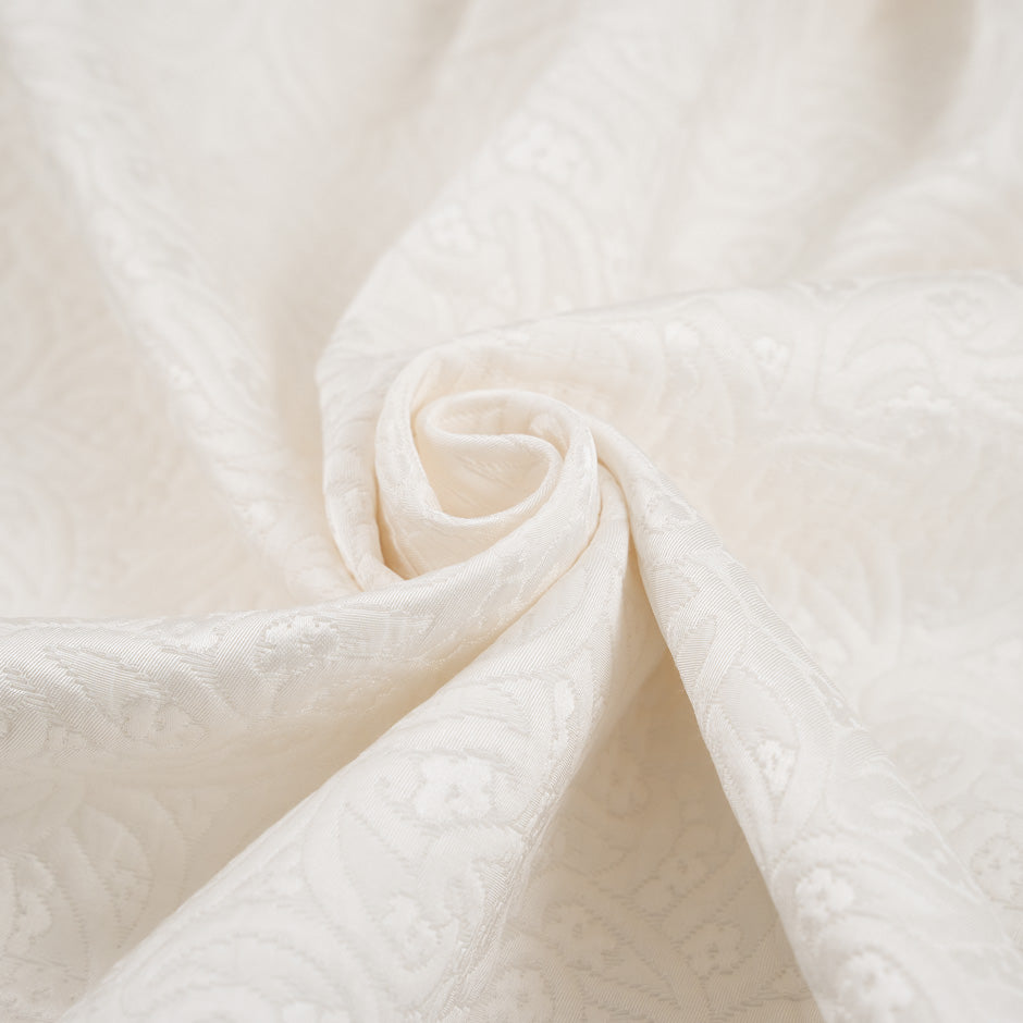 White soft jacquard matelasse. High quality deadstock fabric.