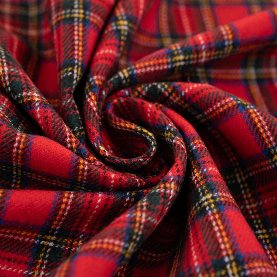 Red, green, yellow and blue mixed plaid wool fabric. High quality deadstock fabric.