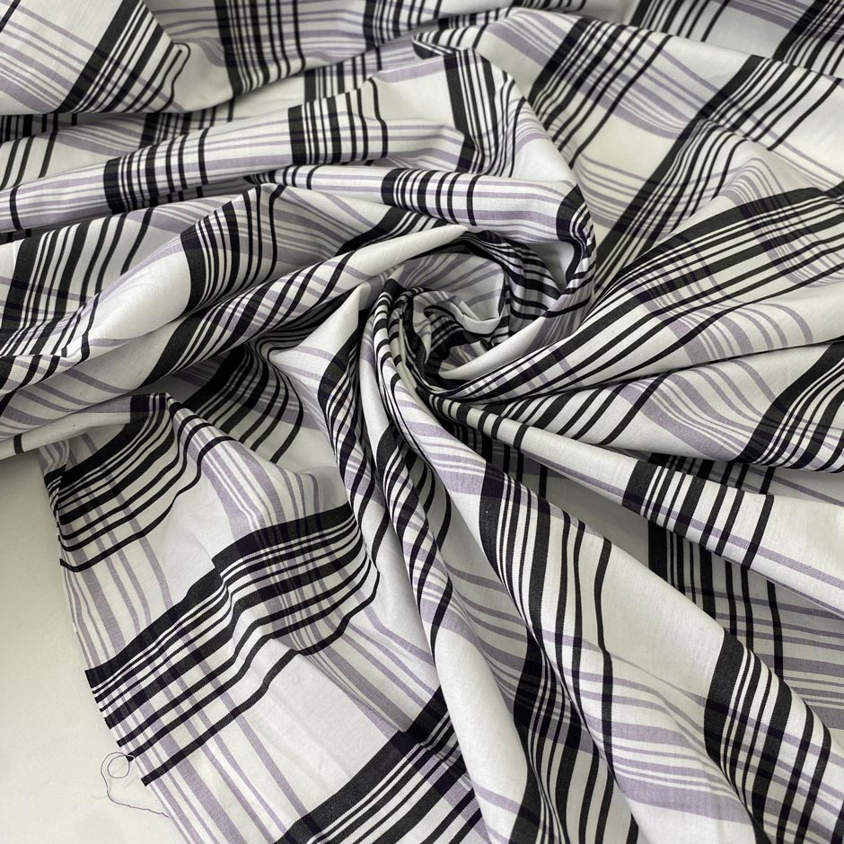 Checked fabric in a wool and cotton blend with a taffeta-like texture that keeps its shape and adds volume. In shades of white, black, and lilac. Ideal for dresses, skirts, and shirting. High-quality deadstock collected in Stock from a Maison de Couture in Italy.