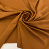 Polyester and Lycra double jersey in brown and black. Very soft and stretch, ideal for jackets and trousers. High-quality deadstock collected in Stock from a Maison de Couture in Italy.