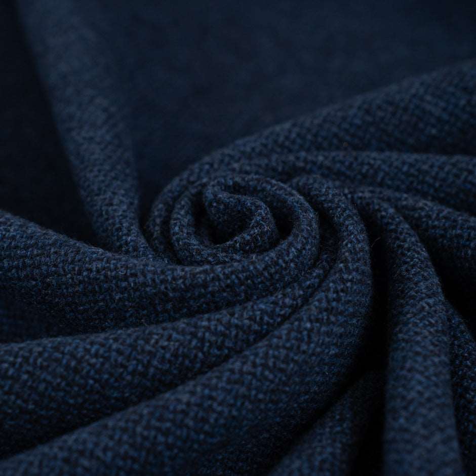 Stretch and spongy blue falling wool. High quality deadstock fabric.
