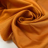Pure viscose in apricot orange very soft, light, and flowy. High-quality deadstock fabric by the meter collected in Stock from a Maison de Couture in Italy.