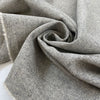 Pure wool in light gray with white threads, very soft and warm with a heavy hand. Ideal for coats, jackets, and structured pieces. High-quality deadstock collected in Stock from a Maison de Couture in Italy.