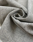 Pure wool in light gray with white threads, very soft and warm with a heavy hand. Ideal for coats, jackets, and structured pieces. High-quality deadstock collected in Stock from a Maison de Couture in Italy.