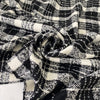 Very soft and warm wool blend with check design in the shades of black and white, color reference Coconut Milk and Forest River. Ideal for coats and jackets. High-quality deadstock collected in Stock from a Maison de Couture in Italy.Very soft and warm wool blend with check design in the shades of black and white, color reference Coconut Milk and Forest River. Ideal for coats and jackets. High-quality deadstock collected in Stock from a Maison de Couture in Italy.Very soft and warm wool blend with check des