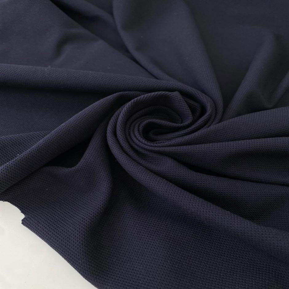 Pure cotton jersey Punto Milano in dark blue. Very soft and stretch, perfect for trousers, dresses, skirts, and jackets. High-quality deadstock collected in Stock from a Maison de Couture in Italy.