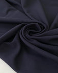 Pure cotton jersey Punto Milano in dark blue. Very soft and stretch, perfect for trousers, dresses, skirts, and jackets. High-quality deadstock collected in Stock from a Maison de Couture in Italy.