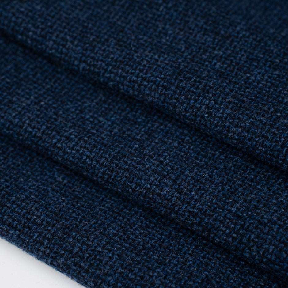 Stretch and spongy blue falling wool. High quality deadstock fabric.