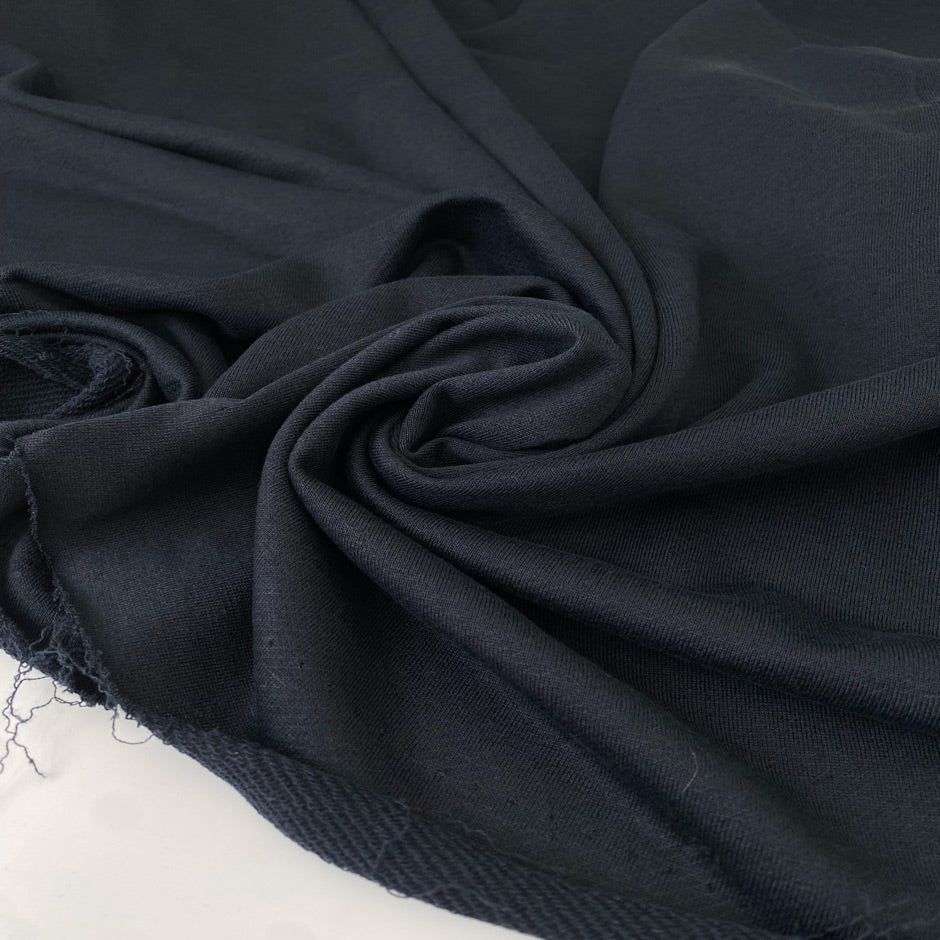 Mixed cotton and linen brushed sweatshirt fabric in woodland gray. Very soft and flowy, ideal for trousers, dresses, sweatshirts, skirts, and jackets. High-quality deadstock collected in Stock from a Maison de Couture in Italy.