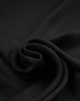 Transparent and soft black silk georgette. High-quality deadstock fabric collected in Stock from a Maison de Couture in Italy.