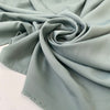 Polyester cady in sage color. Very soft, light, flowy, and not transparent. Ideal for trousers, dresses, and skirts. High-quality deadstock collected in Stock from a Maison de Couture in Italy.