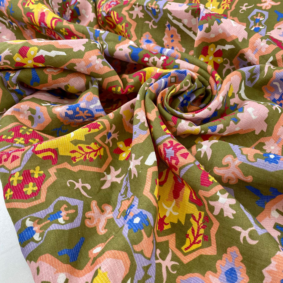 Linen and cotton with a beautiful ethnic print. Multicolor with a green base very soft and light. High-quality deadstock fabric collected in Stock from a Maison de Couture in Italy.