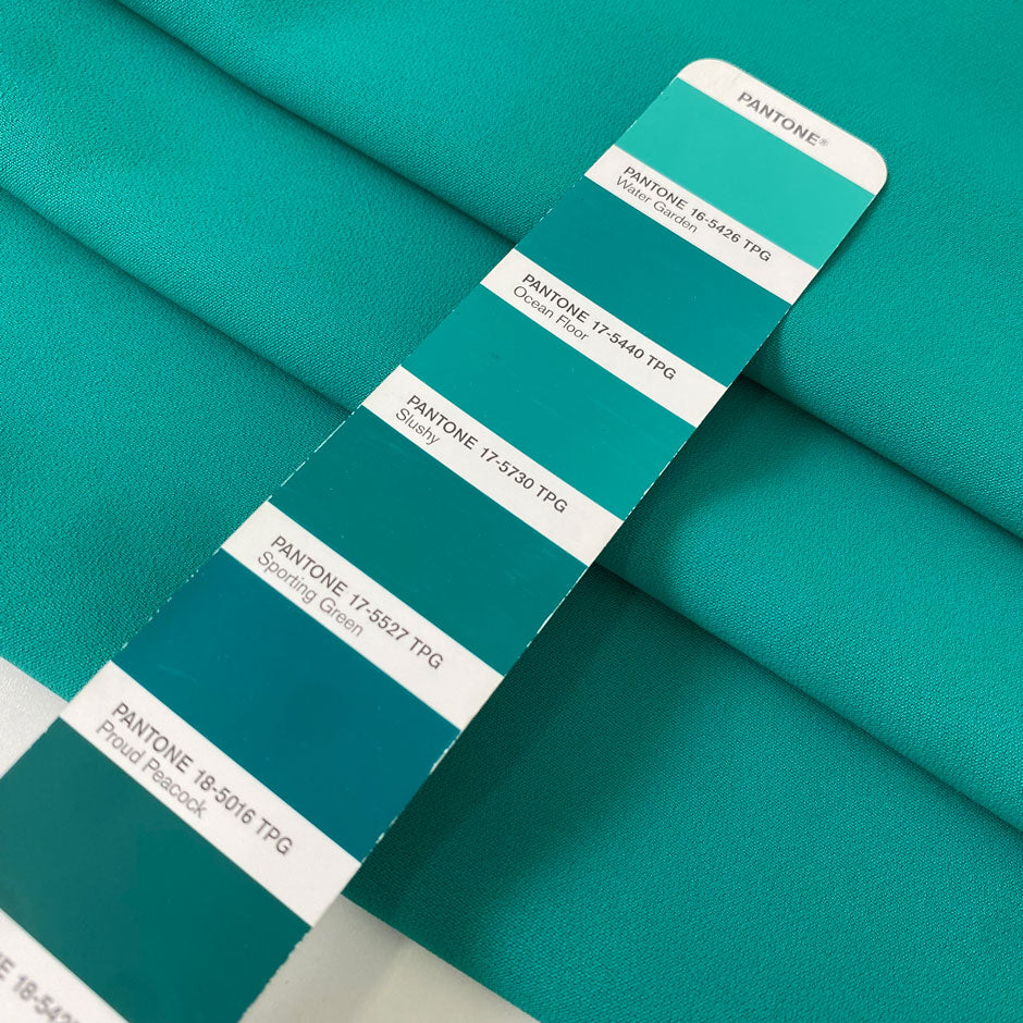 Flowy and soft cady in turquoise with a crepe texture. Made from polyester and elastane, ideal for dresses, trousers, skirts, and light jackets.High-quality deadstock collected in Stock from a Maison de Couture in Italy.