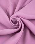 Pink and falling polyester crepe cady. High quality deadstock fabric.