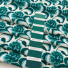 Printed Polyester With A Green And Blue Flower Design
