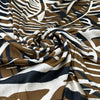 Viscose Satin With A Tobacco Colored Abstract Print