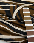 Viscose Satin With A Tobacco Colored Abstract Print