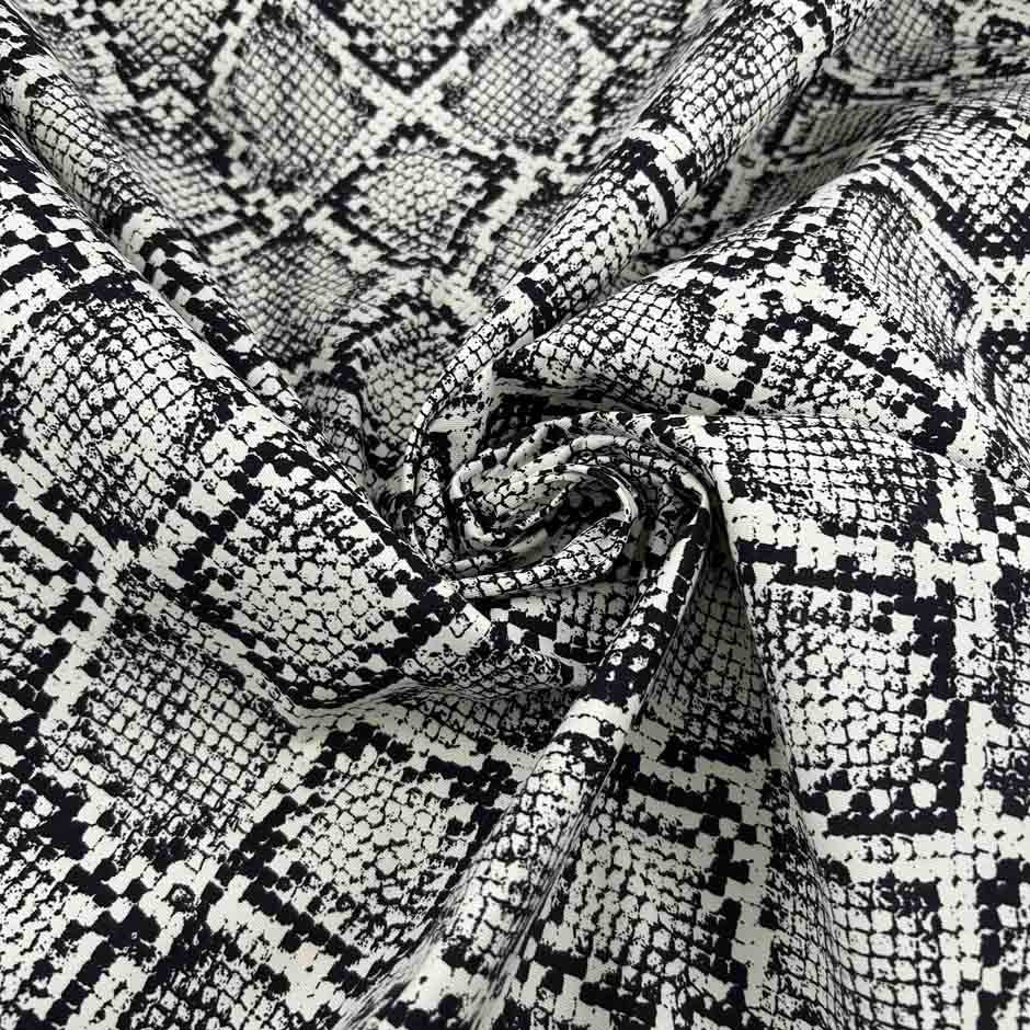 Medium Weight White Base Cotton Gabardine With Black Python Print