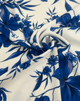 White Polyester With A Blue Floral Print