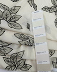 Cream Crepe Polyester With Printed Leaves