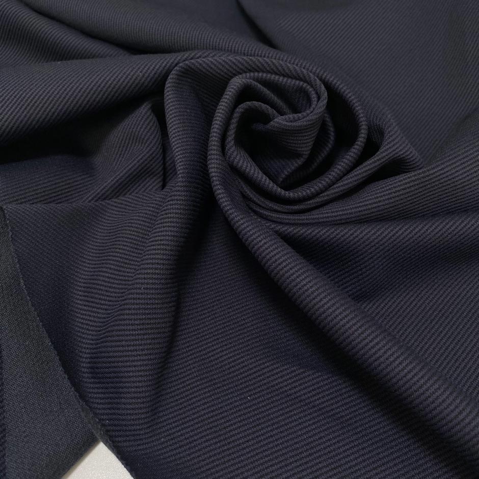 Structured heavy jersey with a refined gabardine texture. Soft yet durable, perfect for trousers, jackets, skirts, and dresses.High-quality deadstock collected in Stock from a Maison de Couture in Italy.