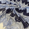 Polyester macramé lace with geometric pattern in light blue, gray, and dark blue. Light, detailed, and double scalloped. Ideal for dresses, skirts, shirting, or blouses. High-quality deadstock collected in Stock from a Maison de Couture in Italy.