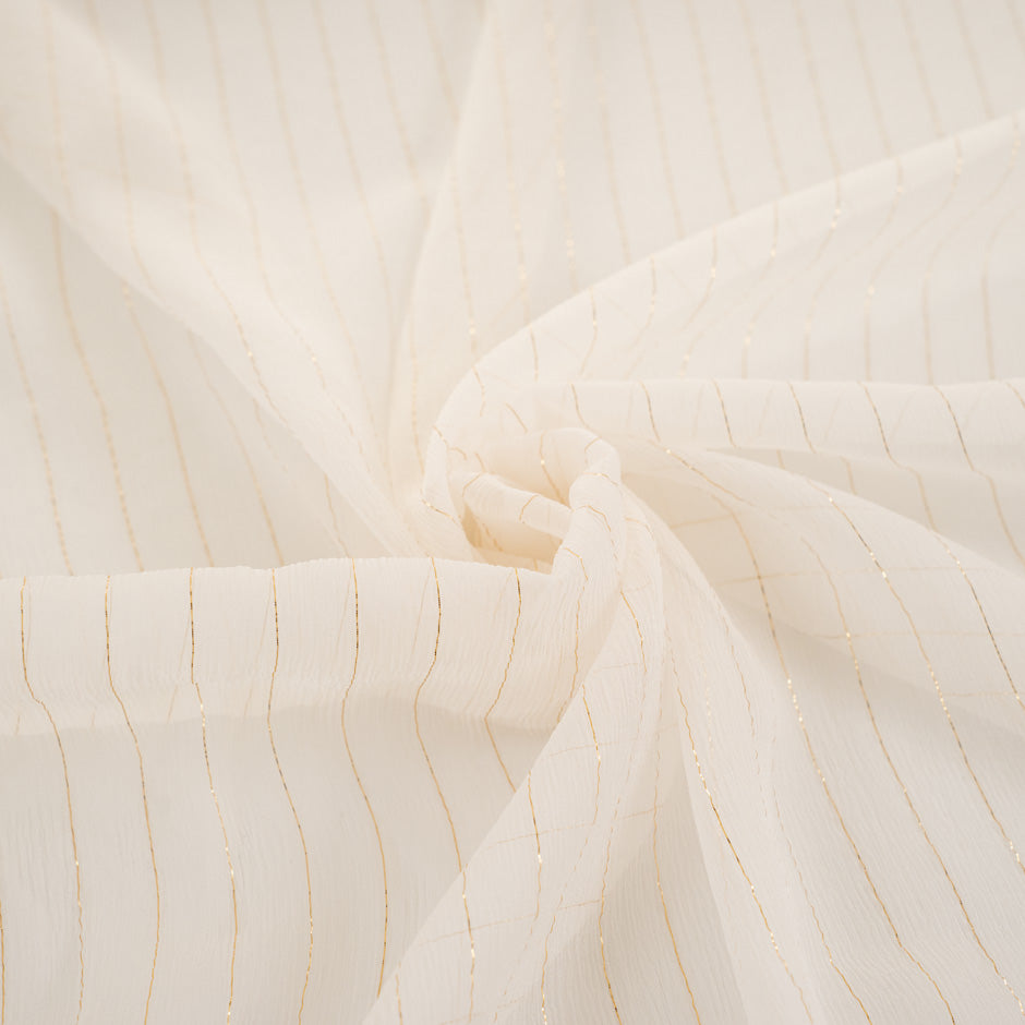 White silk fabric with gold stripes, very light and trasparent. High quality deadstock fabric.