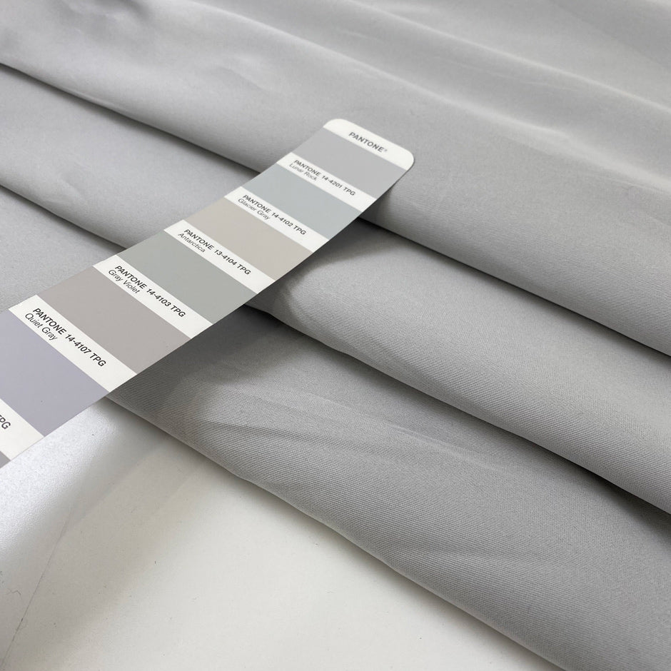 Silk and polyester Mikado double face, dark and light gray very soft. High-quality deadstock fabric collected in Stock from a Maison de Couture in Italy.