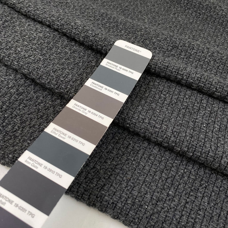 Wool and polyester tweed in smoked pearl grey. Very soft, flowy and medium weight. Ideal for light coats and jackets. High-quality deadstock collected in Stock from a Maison de Couture in Italy.