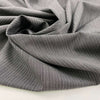 Gray and white stretch wool pinstripes. High quality deadstock fabric.