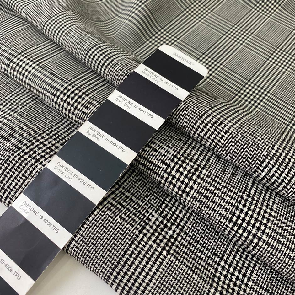 Soft stretch wool with a classic Prince of Wales design in black and white. Perfect for trousers, dresses, skirts, and jackets.High-quality deadstock collected in Stock from a Maison de Couture in Italy.