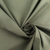Green bielastic cotton gabardine, ideal for trousers. High-quality deadstock collected in Stock from a Maison de Couture in Italy.