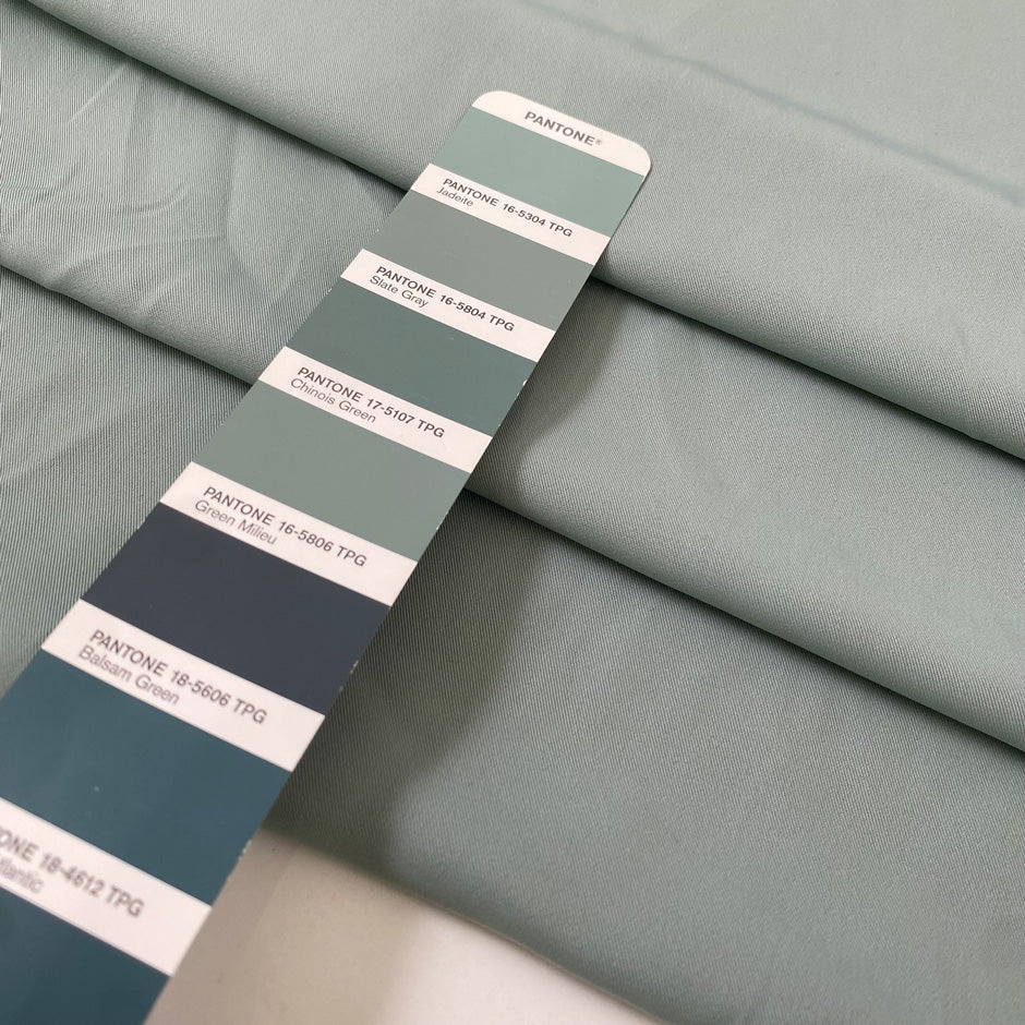 Polyester cady in sage color. Very soft, light, flowy, and not transparent. Ideal for trousers, dresses, and skirts. High-quality deadstock collected in Stock from a Maison de Couture in Italy.