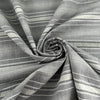 Gray striped cotton jacquard with an irregular pattern, soft and non-stretch. High-quality deadstock collected in Stock from a Maison de Couture in Italy.
