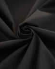 Stretched and textured plain black cotton fabric - High quality deadstock