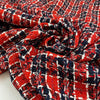 Mixed wool, cotton, and polyester tweed with checks in red, blue, and white shades. Very soft and light. High-quality deadstock fabric by the meter collected in Stock from a Maison de Couture in Italy.