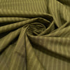 Pure cotton jacquard in avocado green with refined stripe design. Versatile and elegant, ideal for dresses, skirts, and trousers.&nbsp;High-quality deadstock collected in Stock from a Maison de Couture in Italy.