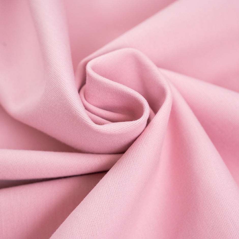 Pink pure cotton jersey coupled double face, stretchy and heavy. High-quality deadstock fabric collected in Stock from a Maison de Couture in Italy.