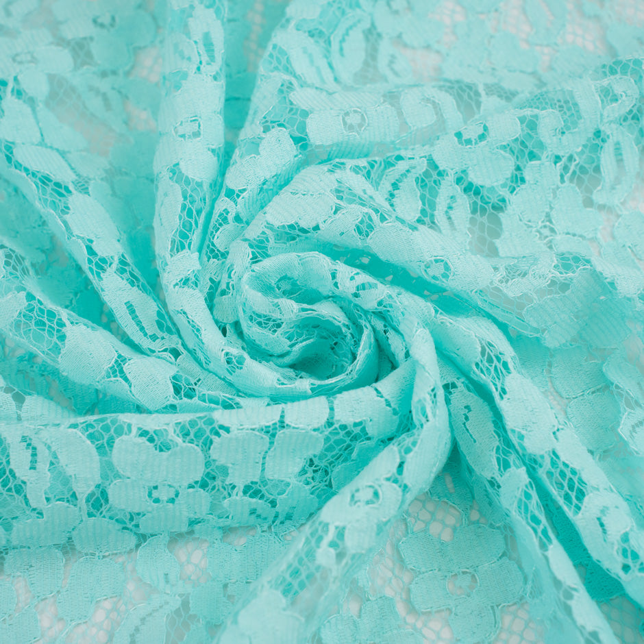 Light blue water lace polyamide and viscose. Transparent and falling. High-quality deadstock fabric collected in Stock from a Maison de Couture in Italy.