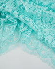 Light blue water lace polyamide and viscose. Transparent and falling. High-quality deadstock fabric collected in Stock from a Maison de Couture in Italy.