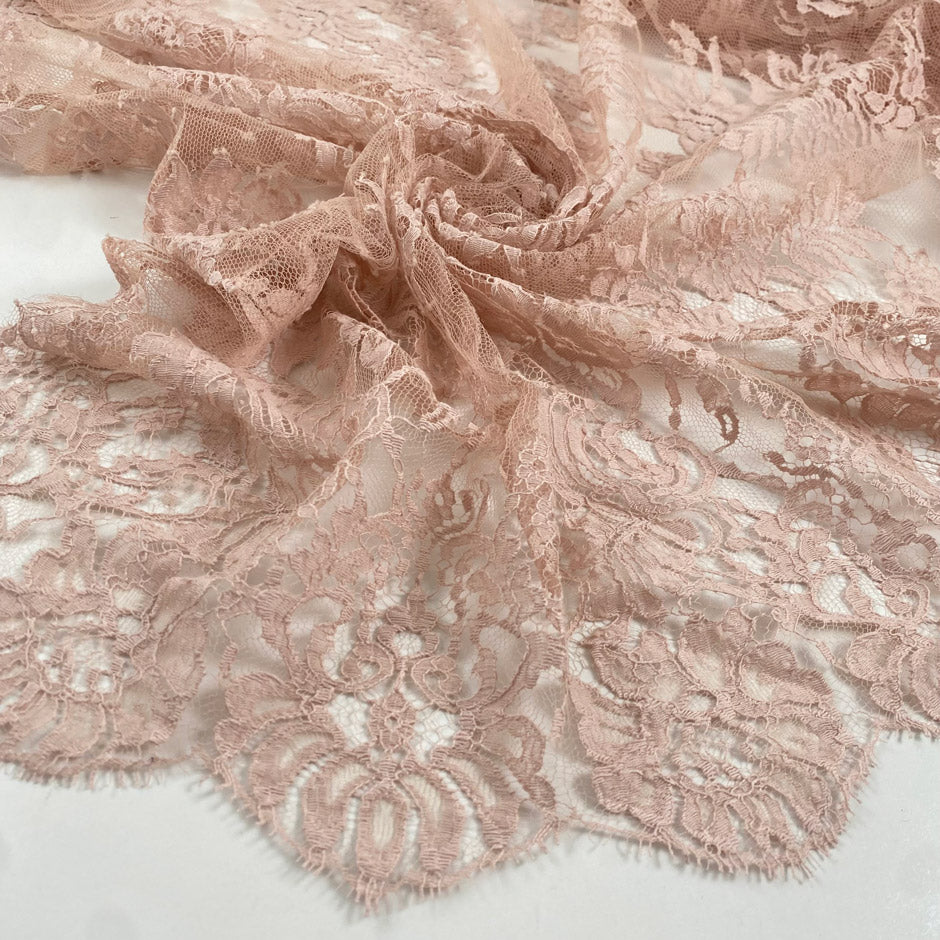 Cotton and polyester lace in skin color, reference Cream Tan. Very light and soft with a double scalloped edge. Ideal for dresses, skirts, and blouses. High-quality deadstock collected in Stock from a Maison de Couture in Italy.
