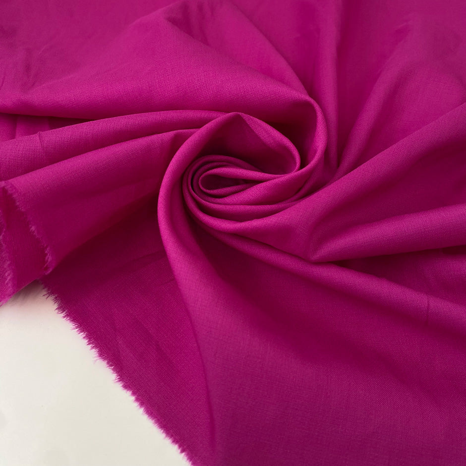 Italian silk in rose violet, very soft and light with gentle structure. Ideal for dresses, skirts, blouses, and shirting. High-quality deadstock collected in Stock from a Maison de Couture in Italy.