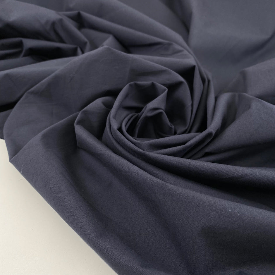 Stretch cotton linen in dark blue, very soft, light, slightly crunchy, and not transparent. Ideal for trousers, jackets, skirts, and dresses. High-quality deadstock collected in Stock from a Maison de Couture in Italy.