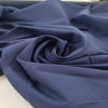 Pure cotton fabric in blue, very thick and stiff with a dry handfeel, ideal for structured garments, jackets, and utility pieces. High-quality deadstock collected in Stock from a Maison de Couture in Italy.