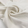 Heavy white cotton with slight stretch, very soft and warm to the touch, ideal for hoodies, jackets, trousers, and structured garments. High-quality deadstock collected in Stock from a Maison de Couture in Italy.
