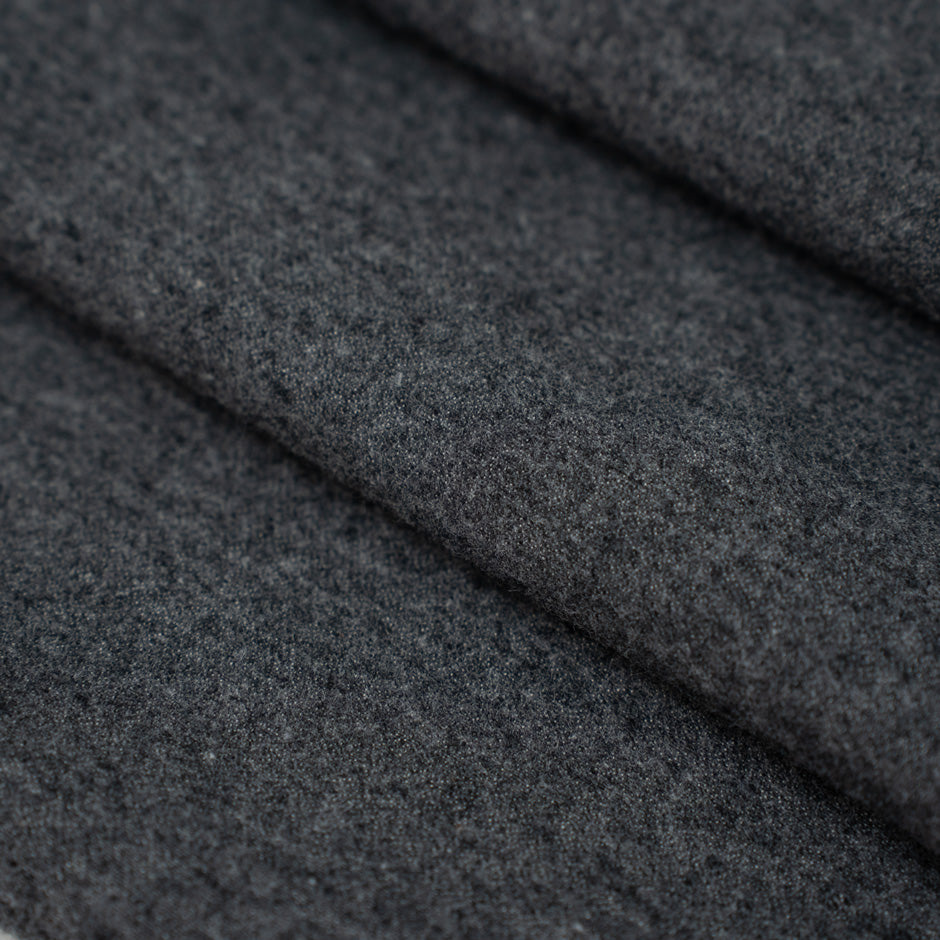 Dark gray colored heavy and falling cotton flannel. &amp;nbsp;High-quality deadstock fabric collected in Stock from a Maison de Couture in Italy.